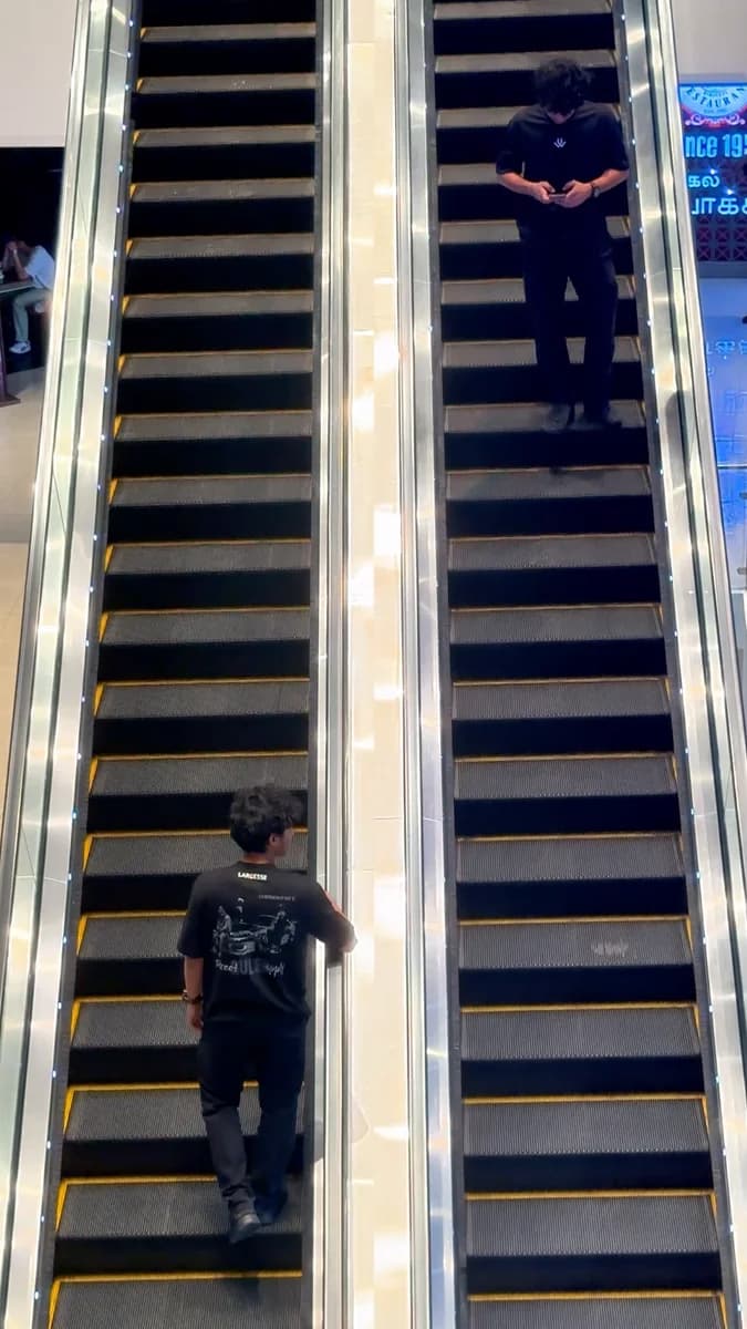 Largesse fashion film on an escalator